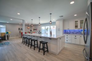 White Cabinets, Black Stainless Steel Appliances & Black drawer pulls and handles